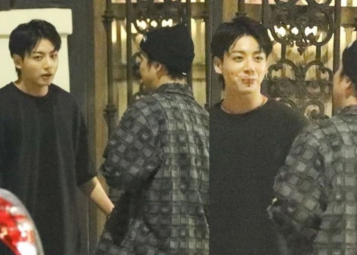 Nam idol đang cầm điếu thuốc lá, vừa hút vừa cười nói vui vẻ với người đi cùng mà không hề hay biết đã bị paparazzi chụp ảnh