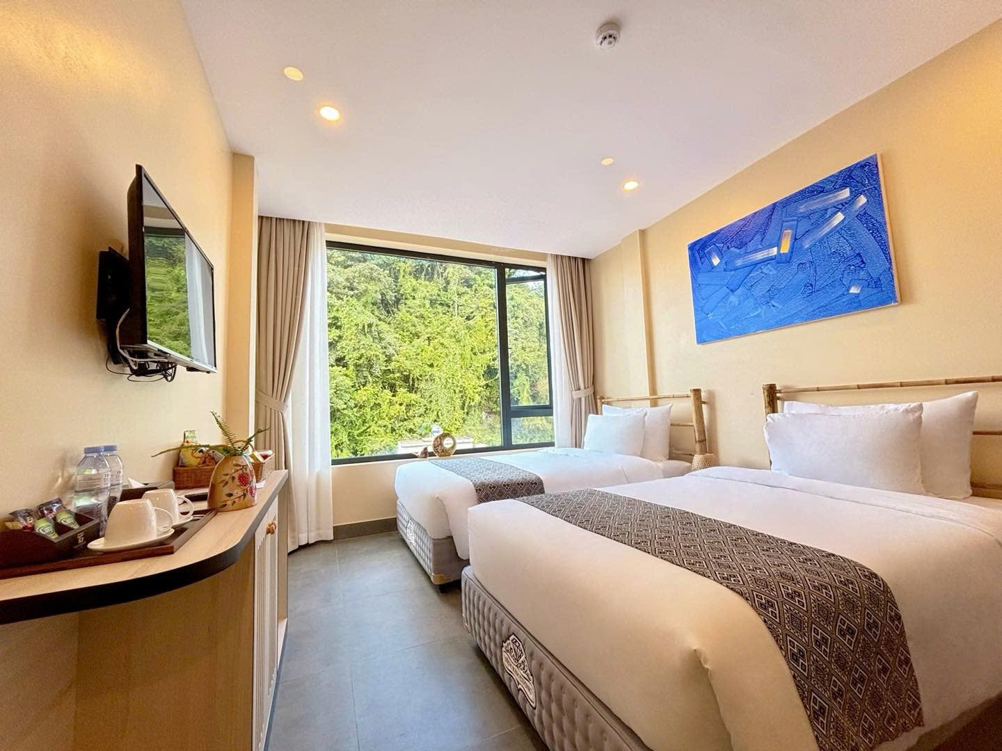 Phòng nghỉ rộng rãi, giá 'mềm' cực kỳ phù hợp cho các gia đình (Ảnh: Khách sạn Trường Giang Mộc Châu)