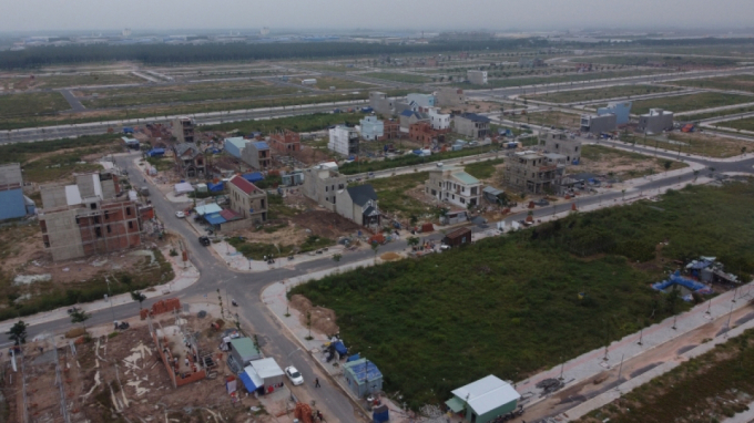Nhộn nhịp xây nhà tại khu tái định cư Lộc An - Bình Sơn, huyện Long Thành (Ảnh: Duy Phương).
