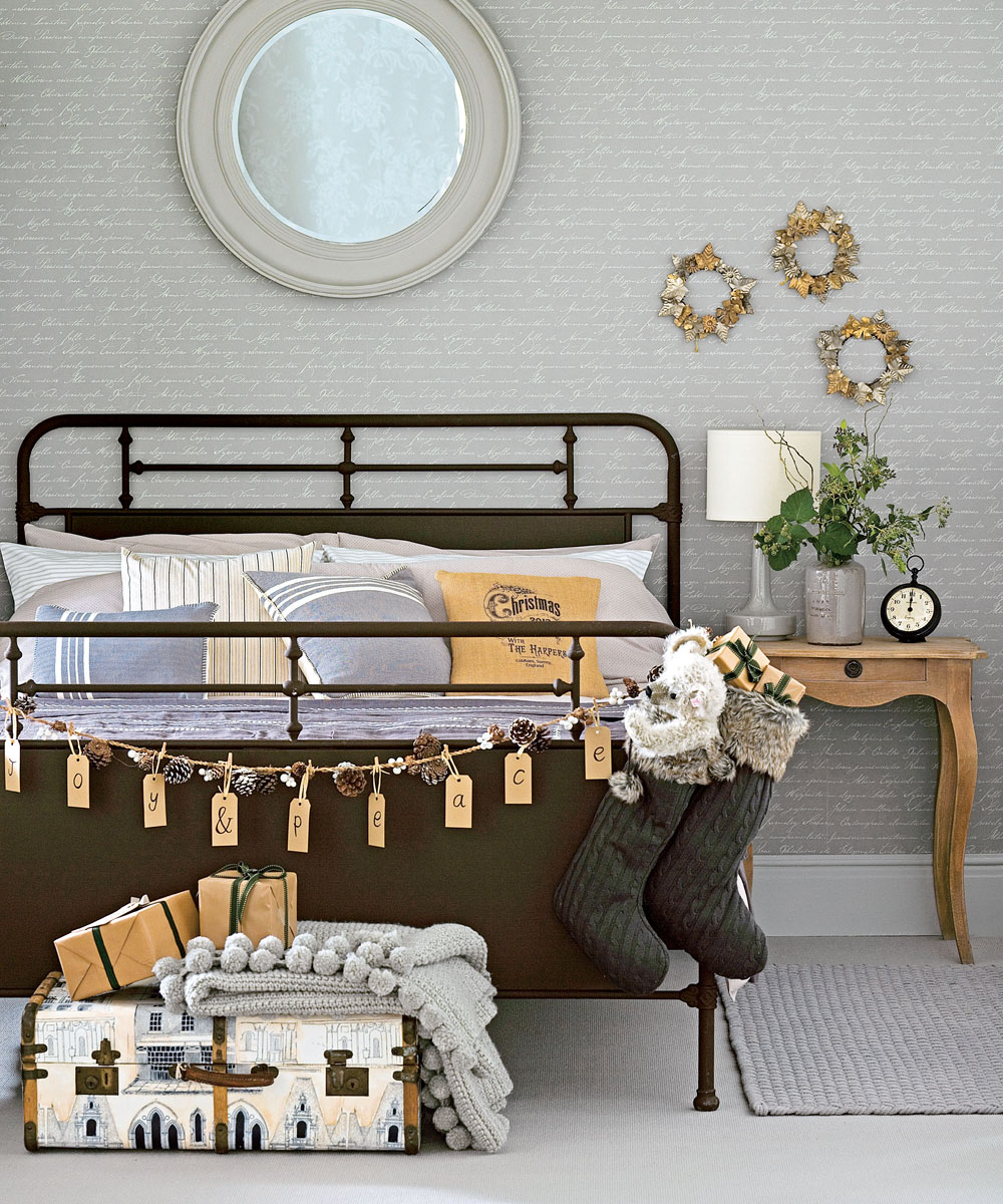 christmas-bedroom-with-iron-bed-and-rustic-decorations