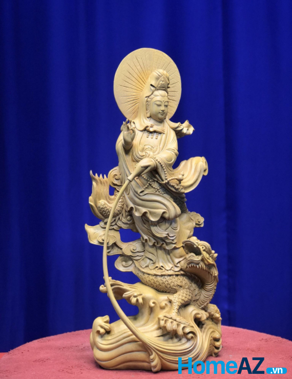 Nhiều người vẫn chưa biết mua tượng Phật Quan Âm đứng rồng bằng gỗ pơ mu ở đâu, uy tín và chất lượng.