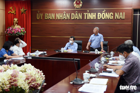 Ông Cao Tiến Dũng - chủ tịch UBND tỉnh Đồng Nai - phát biểu tại buổi làm việc với đoàn công tác của Bộ Xây dựng chiều 16-11 - Ảnh: A LỘC