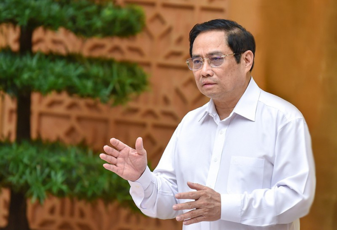Thủ tướng Phạm Minh Chính nêu những mốc thời gian cụ thể cho nhiệm vụ tiêm vaccine ngừa Covid-19. Ảnh: VGP.