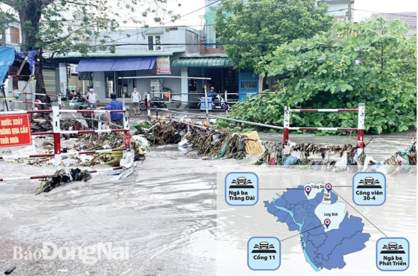 Khu vực cầu Bà Lúa (P.Long Bình Tân, TP.Biên Hòa) sau cơn mưa lớn, nước dâng cao nhấn chìm cả cây cầu dân sinh. Đồ họa thể hiện thông tin các điểm ngập nặng trên địa bàn TP.Biên Hòa. Ảnh. Đồ họa: THANH HẢI