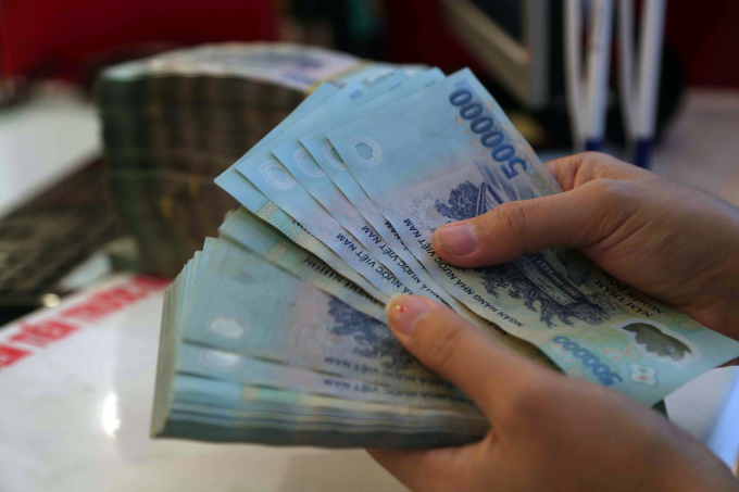 Để tránh mâu thuẫn gia đình, vợ chồng xài tiền chung nên trao đổi ý kiến của nhau NGỌC THẠCH