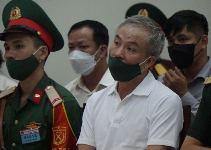 Các bị cáo Nguyễn Thế Anh (ảnh trên) và Lê Văn Minh tại phiên tòa GIA HÂN