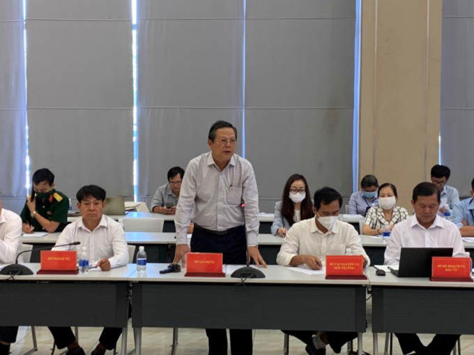 Ông Lê Quang Vinh trả lời câu hỏi của phóng viên về dự án Khu dân cư Thế kỷ 21 . Ảnh: Lâm Thiện