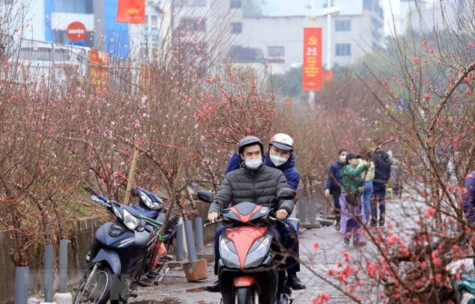 Bộ Tài chính đề xuất nghỉ Tết Nguyên đán 9 ngày (Ảnh minh họa: KT)