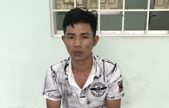 Bị can Dương Minh Tuấn là đối tượng cầm đầu băng nhóm mua bán, chế tạo, tàng trữ vũ khí nguy hiểm. Ảnh: QUỐC BÌNH