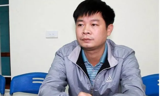 Trần Văn Giang tại cơ quan công an. Ảnh: V. Hâu
