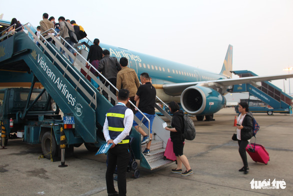 Khách đi Vietnam Airlines được làm check-in online tất cả sân bay nội địa - Ảnh: CÔNG TRUNG