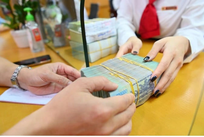 Từ 1/12, giao dịch từ 400 triệu đồng trở lên phải báo cáo Ngân hàng Nhà nước (Ảnh minh họa: Tiến Tuấn).