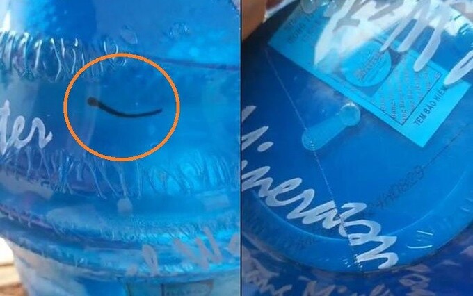 Bình nước lọc có đỉa được phát hiện tại Trường mầm non Phong Thủy dù còn nguyên tem.