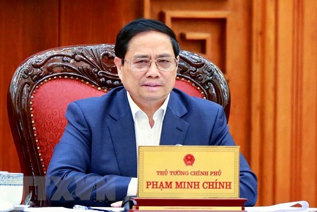 Thủ tướng Phạm Minh Chính chủ trì cuộc họp về bảo đảm cung ứng điện cho sản xuất kinh doanh và tiêu dùng. (Ảnh: TTXVN)
