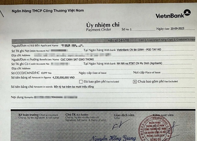 Phiếu xác nhận ủy nhiệm chi của người trúng đấu giá biển số 99A - 666.66 - Ảnh: H.Q.