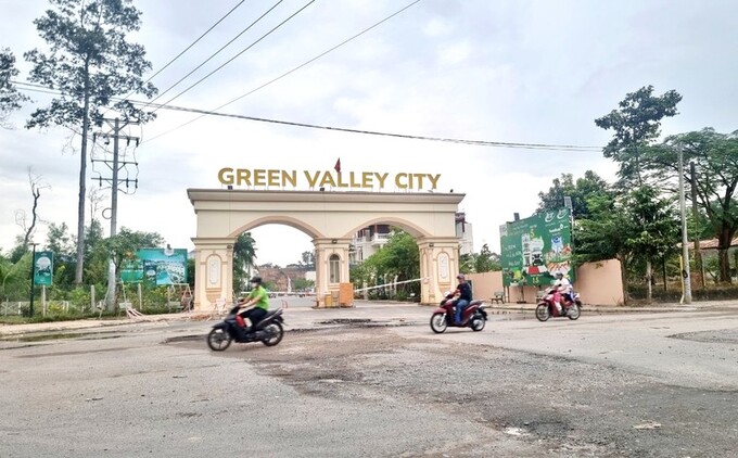 Sau nhiều lùm xùm, Dự án Khu nhà ở Sài Gòn Center đã được đổi tên thành Green Valley City. (Ảnh: Lê Xuân Thọ)