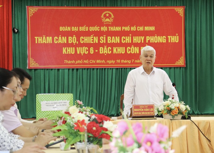 Đồng chí Nguyễn Văn Lợi trao đổi tại buổi gặp gỡ