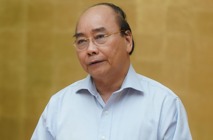 Thủ tướng Nguyễn Xuân Phúc chủ trì họp Thường trực Chính phủ về phòng chống Covid-19, sáng 15/5. Ảnh: VGP