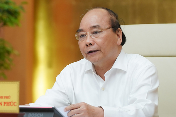 Thủ tướng Nguyễn Xuân Phúc: Nghiên cứu chiến lược phòng, chống dịch Covid-19 cho giai đoạn mới, lâu dài, bảo đảm hiệu quả về y tế, bền vững về kinh tế