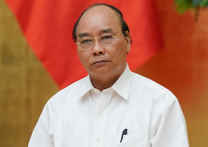 Thủ tướng Nguyễn Xuân Phúc chủ trì họp Thường trực Chính phủ về phòng chống Covid-19, sáng 25/7. Ảnh: Quang Hiếu