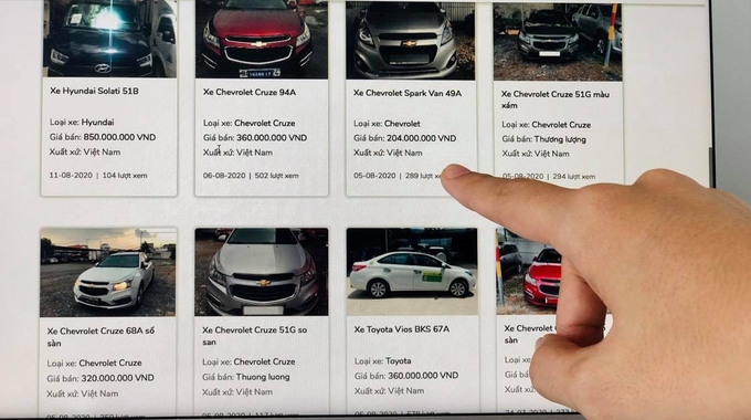 Danh sách ôtô được rao bán thanh lý của một ngân hàng. Ảnh: Quỳnh Trang.