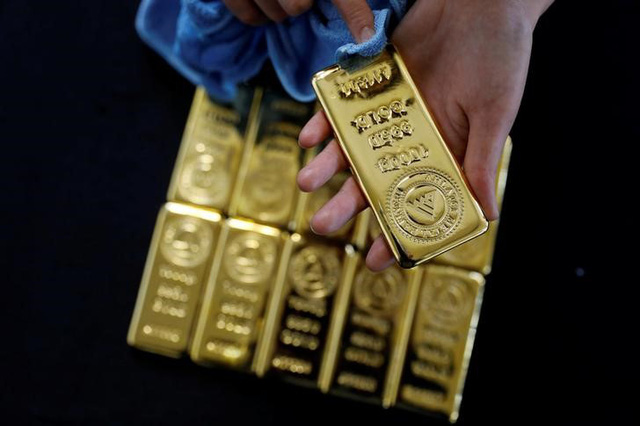 Giá vàng thế giới giảm xuống mức thấp của gần 2 tuần trong phiên 15/9 do đồng USD mạnh lên. (Ảnh minh họa: Reuters)