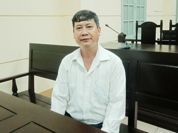 Ông Phan Ngọc Minh tại phiên tòa sơ thẩm. Ảnh: CÙ HIỀN