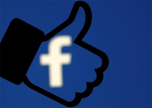 Nút like Facebook được in 3D ở phía trước logo Facebook