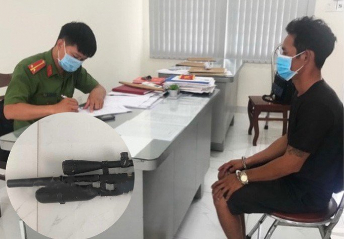 Đối tượng Dương Bảo Anh cùng khẩu súng hơi gây án
