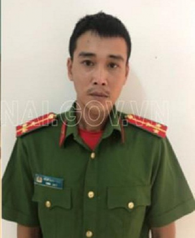 Nghi can Toản với trang phục công an hàm đại úy. Ảnh: CAĐN.