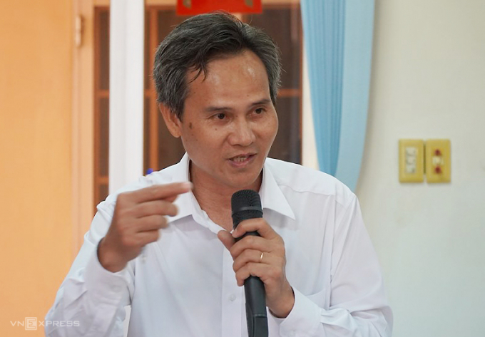 Thẩm phán Lê Viết Hòa, thành viên HĐXX vụ án, tại họp báo. Ảnh: Phước Tuấn.