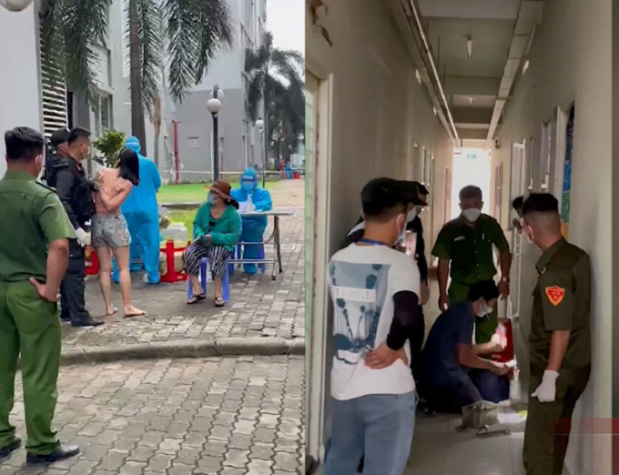 Lực lượng chức năng phường Vĩnh Phú phá khóa và cưỡng chế người phụ nữ để test COVID. Ảnh: Cắt từ clip