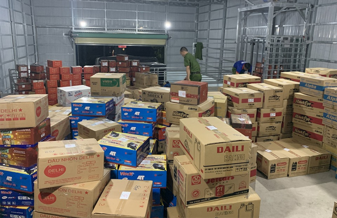 Dưới sự chỉ đạo trực tiếp của Đại tá Đinh Văn Nơi - Giám đốc Công an An Giang, lực lượng Công an An Giang đã phát hiện và bắt giữ giám đốc doanh nghiệp sở hữu kho hàng giá số lượng khủng. Ảnh: Vũ Tiến