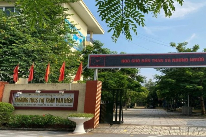 Trường THCS Thị trấn Văn Điển, nơi xảy ra sự việc giáo viên bị trừ điểm thi đua khi trở thành F0.