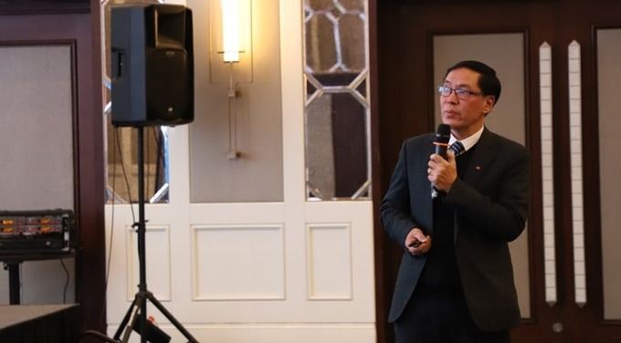 Vụ trưởng Vụ Hợp tác Quốc tế Đặng Quang Tấn báo cáo tại cuộc họp